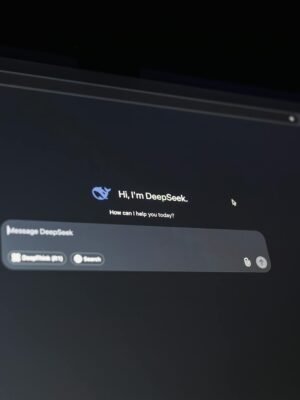 A dark-themed chat interface displaying an AI assistant conversation starter on a screen.